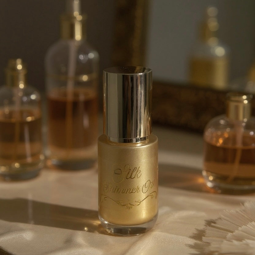 Silk Shimmer Oil by MA BEAUTY in warm candlelit setting