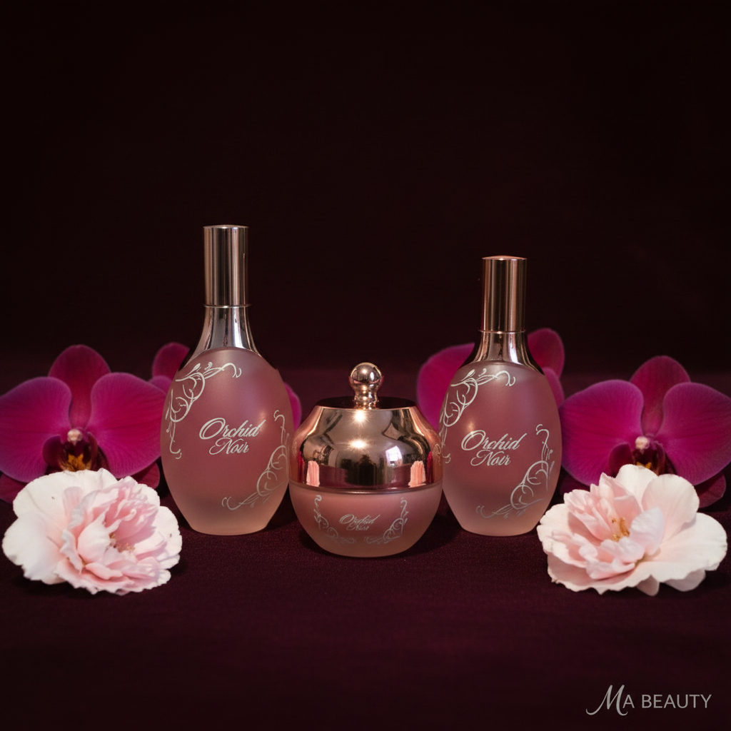 Two body oil bottles with a small container labeled 'Orchid Kiss' surrounded by flowers on a dark background.